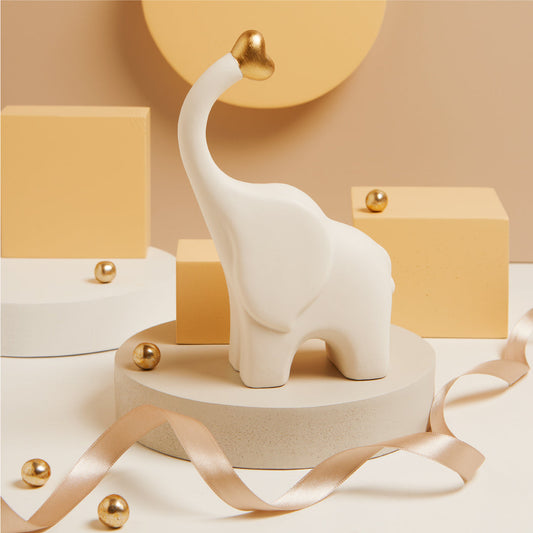 ELEFANTINO BIANCO
CON CUORE ORO
11.5X5.5X19 CM