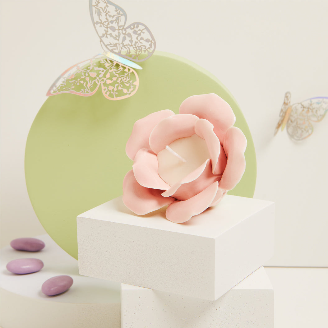 ROSA IN PORCELLANA ROSA CON CANDELA
9.5X9.5X6.5 CM