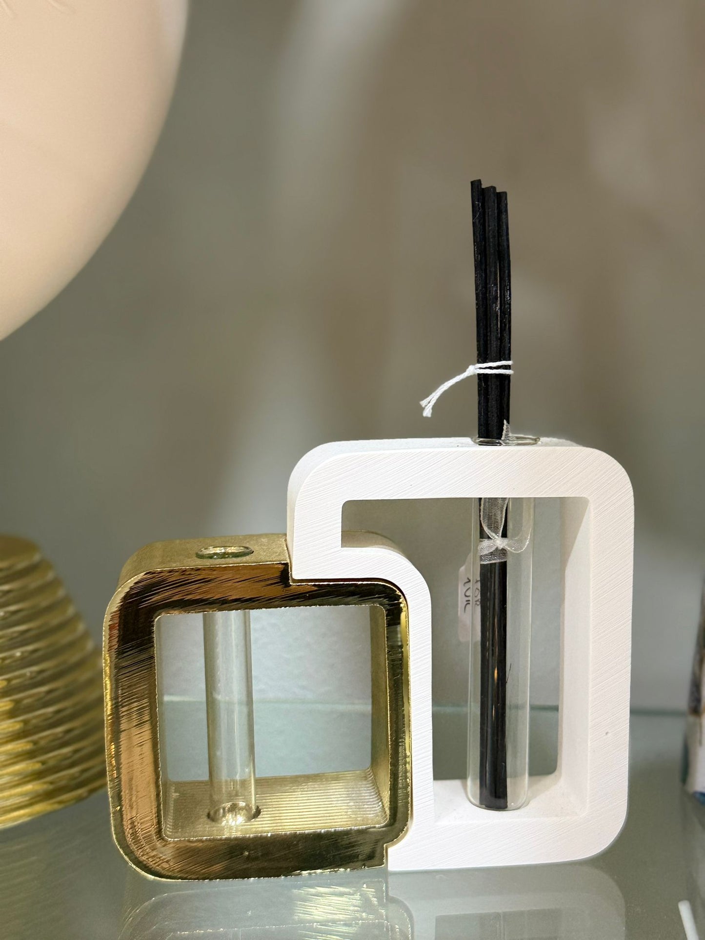 Profumatore bianco e oro