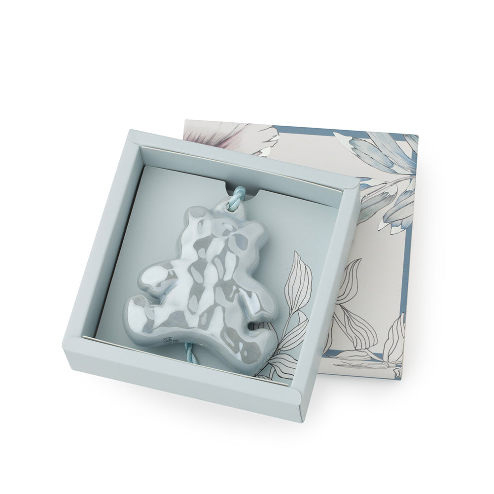 farfalla e orsetto in porcellana