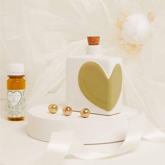OLIERA CUORE VERDE
CON OLIO 60 ML
9X4X10.6 CM CAPACITA’ 200ML