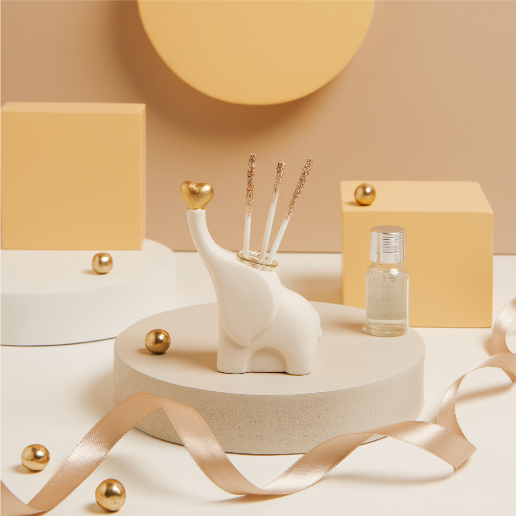 Diffusore elefantino bianco con cuore oro