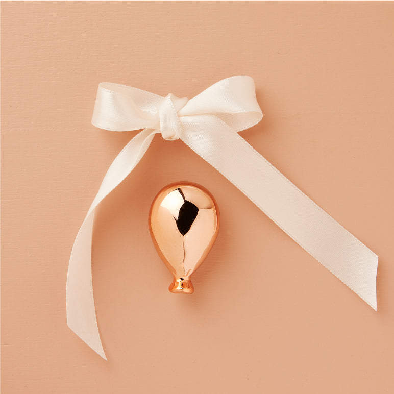 Calamita palloncino oro rosa