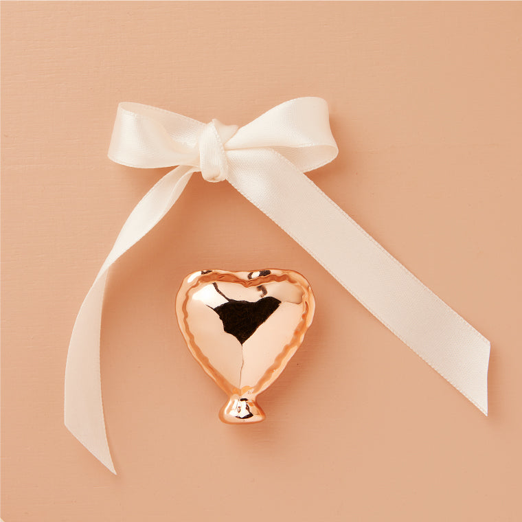 Calamita cuore oro rosa