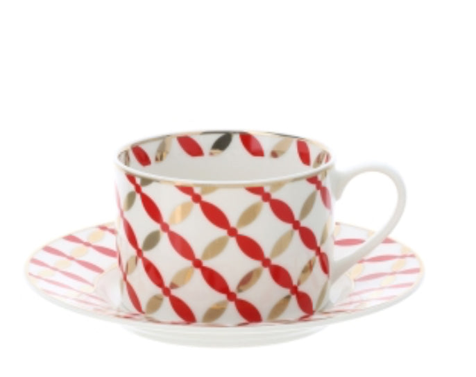 Tazza da tè rossa e oro