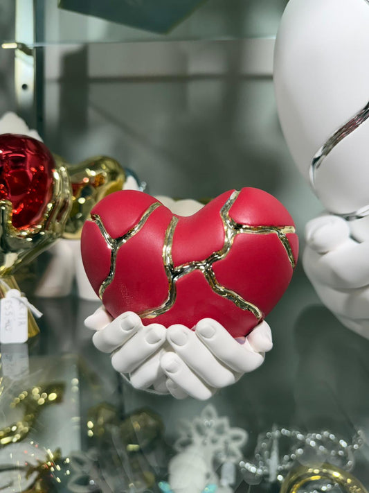 Cuore in mano rosso piccolo