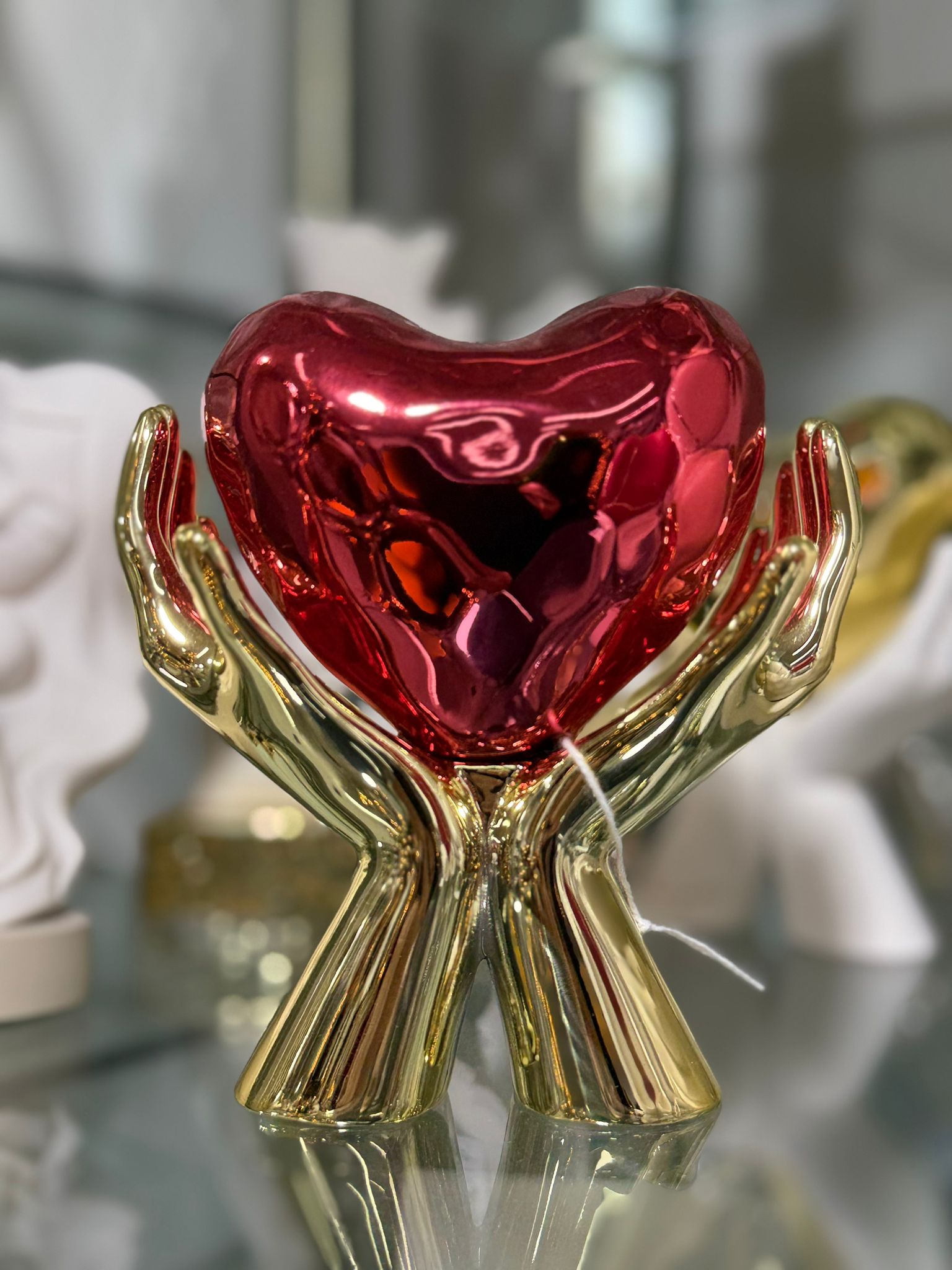 Cuore mani rosso e oro