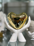 Cuore mani oro e bianco