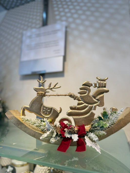 Slitta a dondolo con Babbo Natale e renna