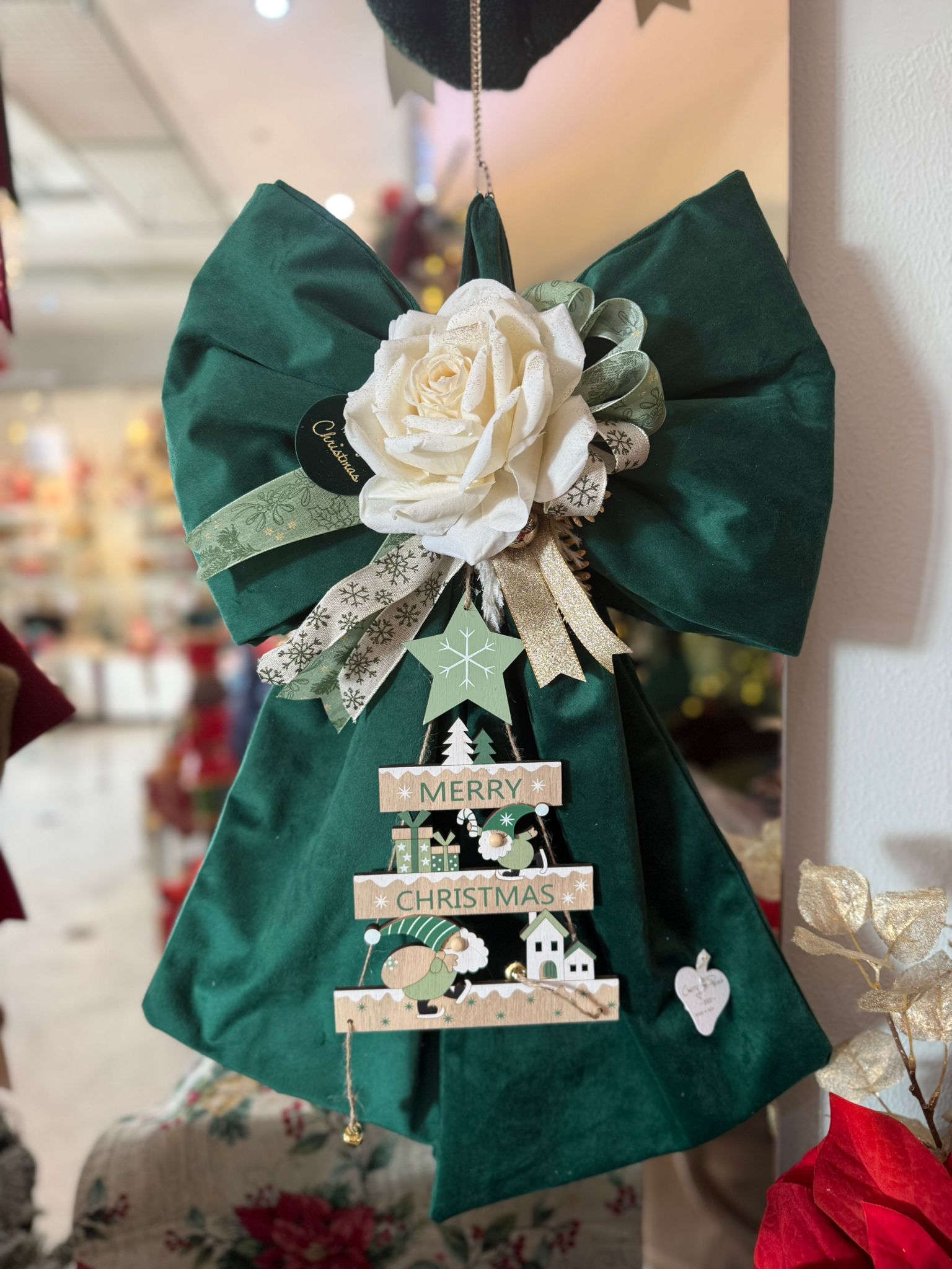 Fiocco verde in velluto con rosa