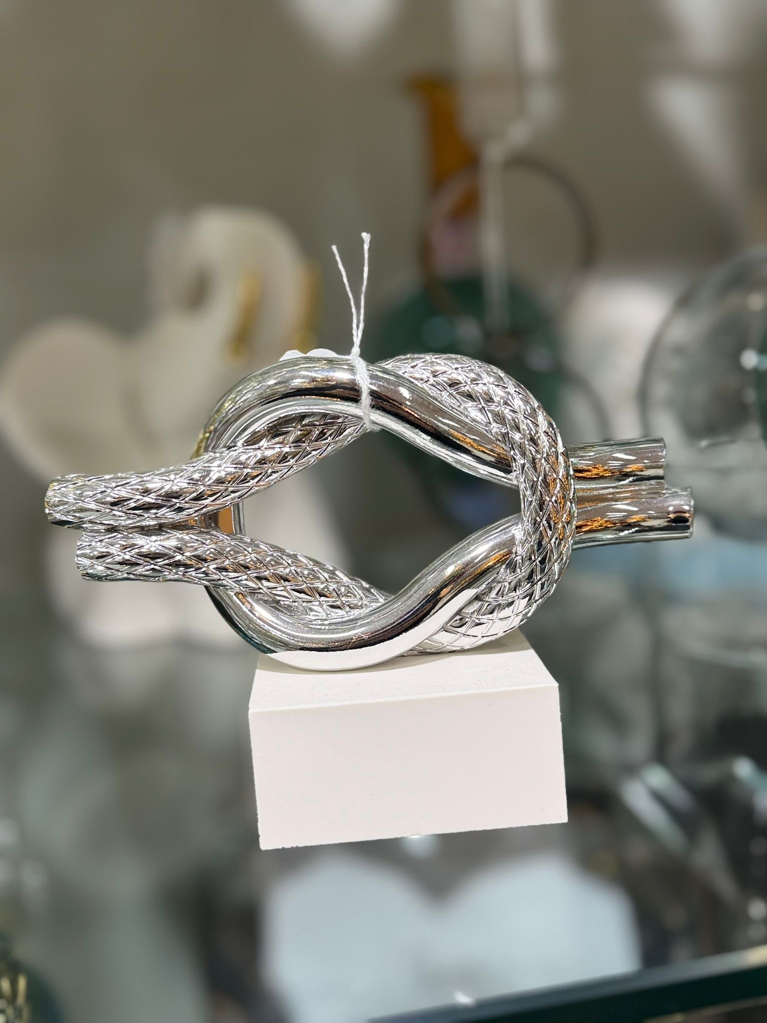 Nodo d'amore in metallo argentato