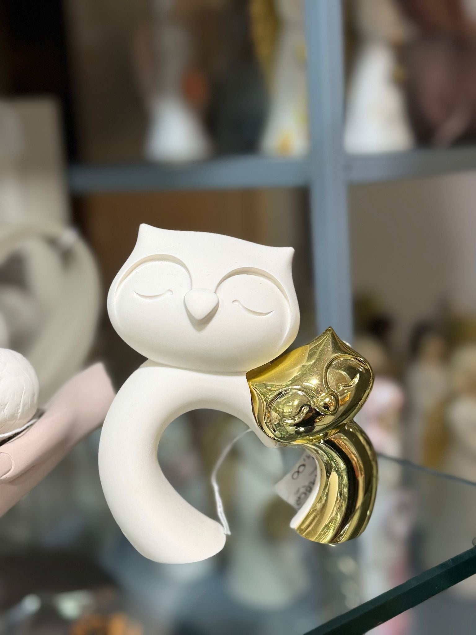 Civetta bianca e oro