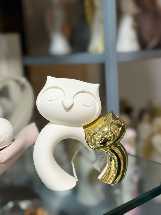 Civetta bianca e oro