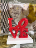 "Love" in ceramica rossa lucida