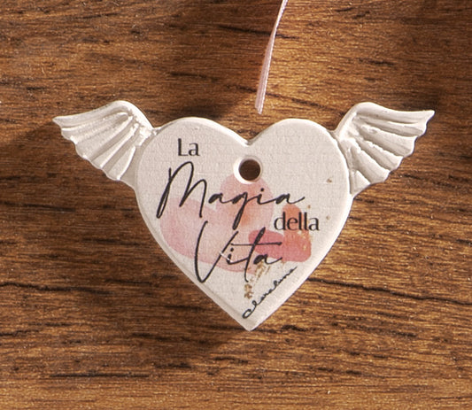 ciondolo in gesso ex voto