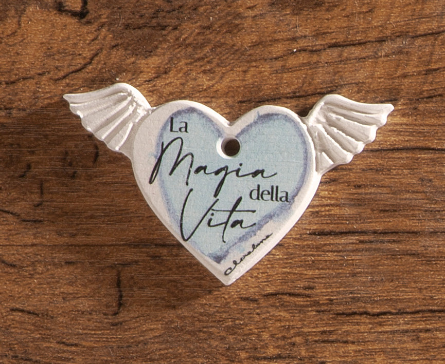 ciondolo in gesso ex voto